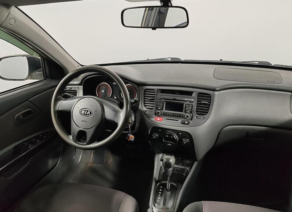 Kia Rio, II Рестайлинг 1.4 AT (95 л.с.)