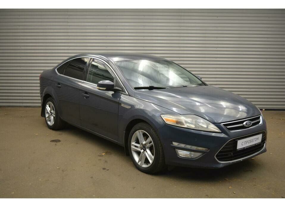 Ford Mondeo 2.0d AT (140 л.с.)