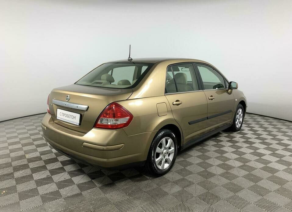 Nissan Tiida 1.6 AT (110 л.с.)