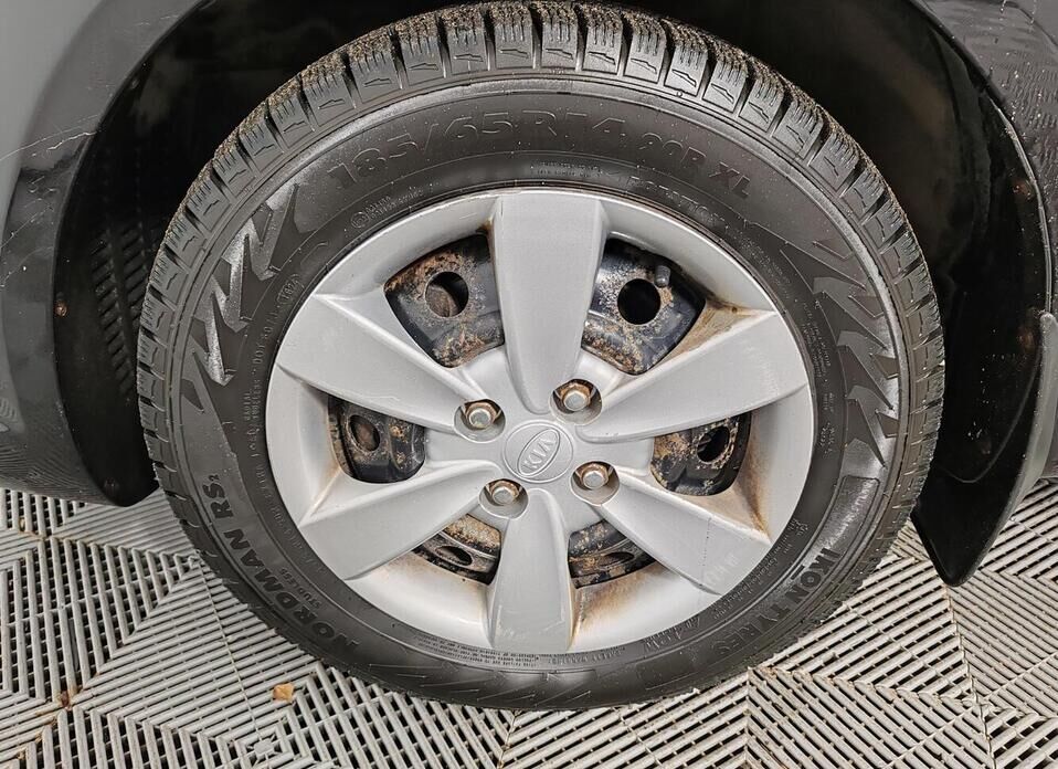 Kia Rio, II Рестайлинг 1.4 AT (95 л.с.)