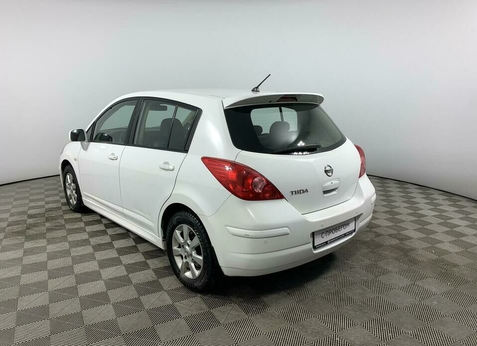 Nissan Tiida 1.6 AT (110 л.с.)