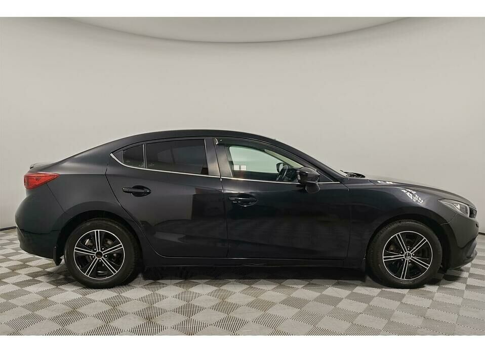 Mazda 3 1.6 AT (104 л.с.)
