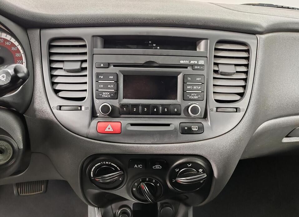 Kia Rio, II Рестайлинг 1.4 AT (95 л.с.)