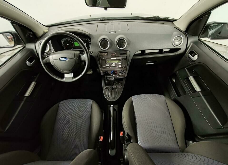 Ford Fusion 1.6 AT (101 л.с.)