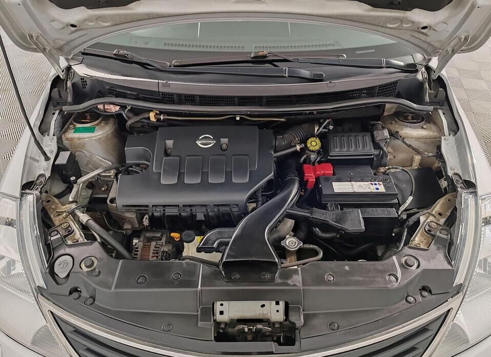 Nissan Tiida 1.6 AT (110 л.с.)