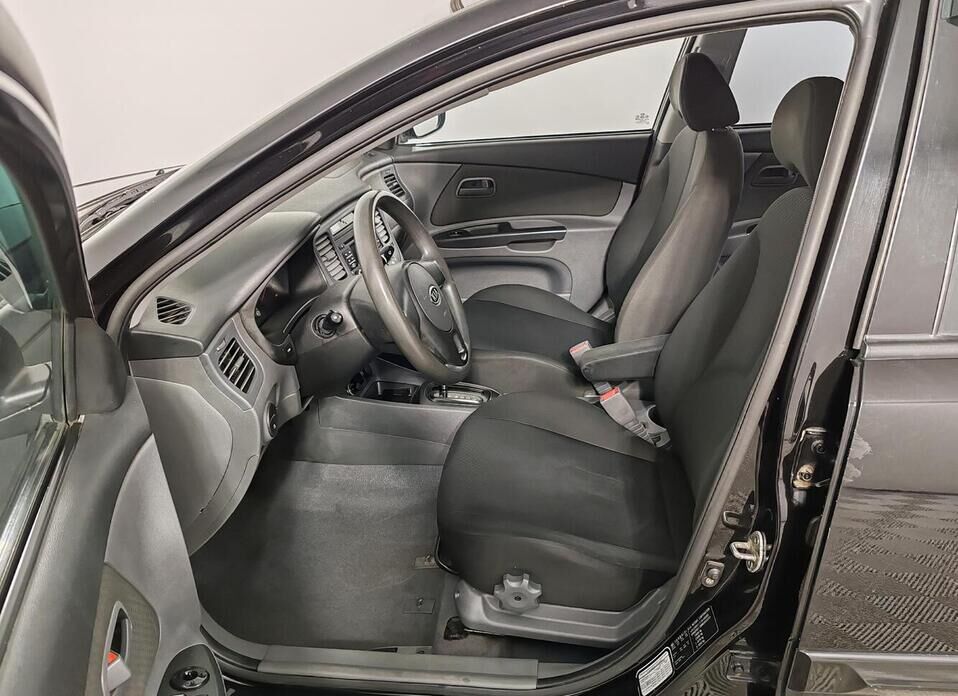 Kia Rio, II Рестайлинг 1.4 AT (95 л.с.)