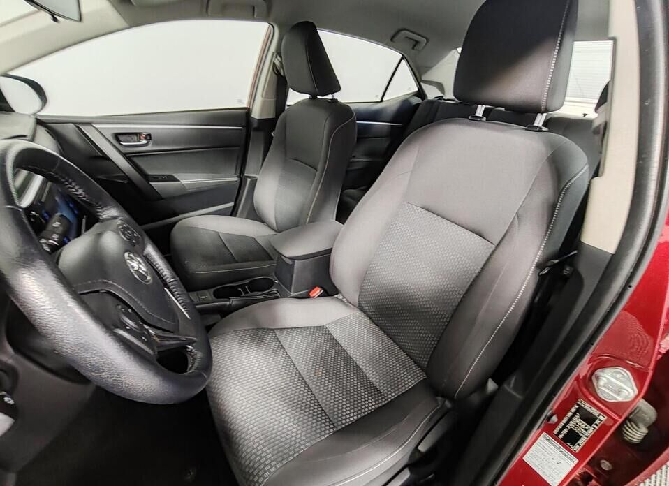 Toyota Corolla, XI (E160, E170) Рестайлинг 1 1.6 CVT (122 л.с.)