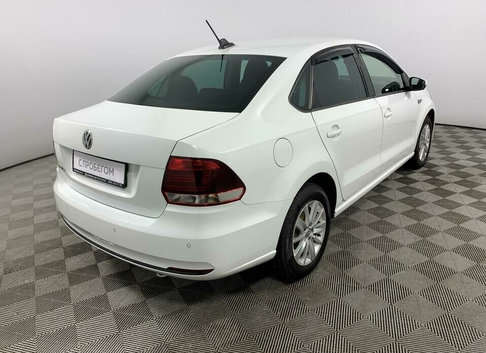 Volkswagen Polo 1.6 AT (110 л.с.)