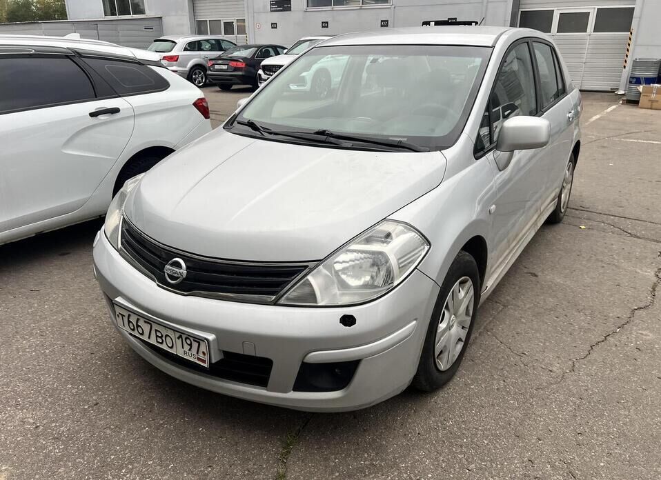 Nissan Tiida, I 1.6 MT (110 л.с.)