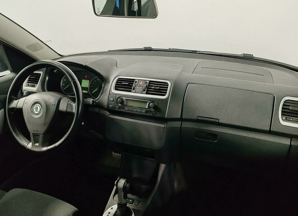Skoda Roomster 1.6 AT (105 л.с.)