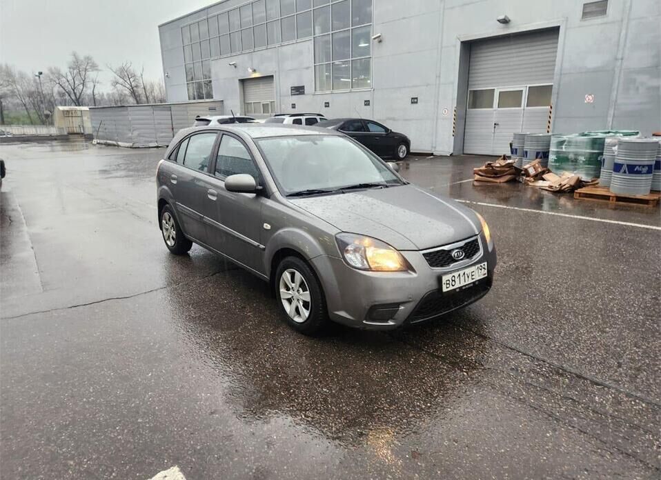 Kia Rio, II Рестайлинг 1.4 AT (95 л.с.)