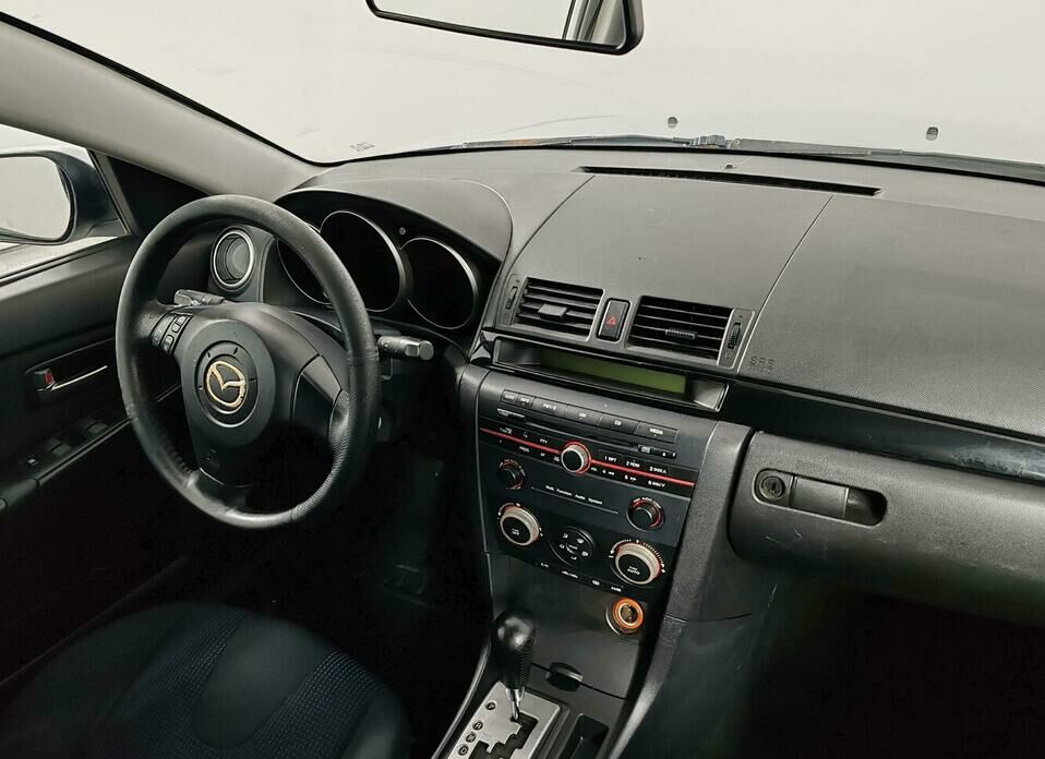 Mazda 3 1.6 AT (105 л.с.)