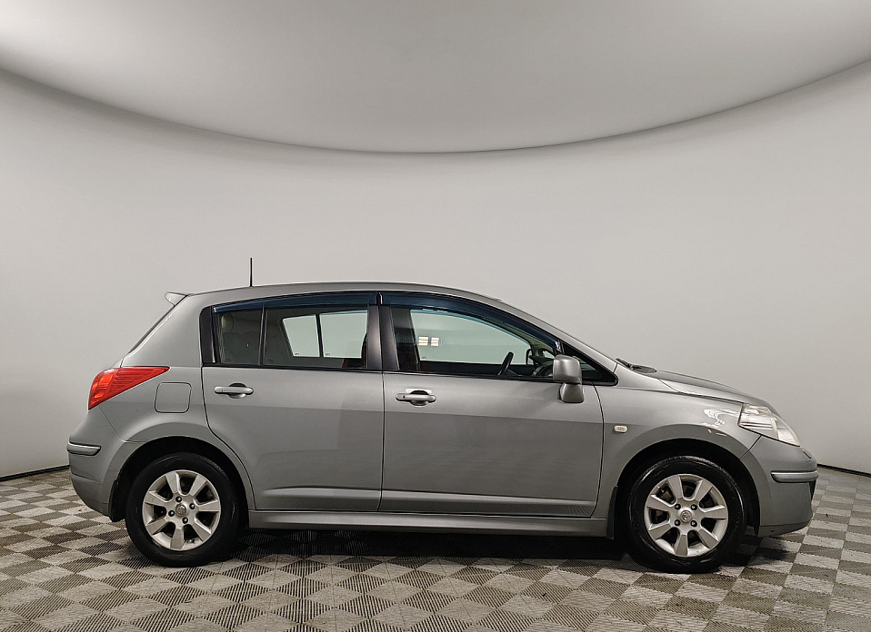 Nissan Tiida, I Рестайлинг 1.6 AT (110 л.с.)
