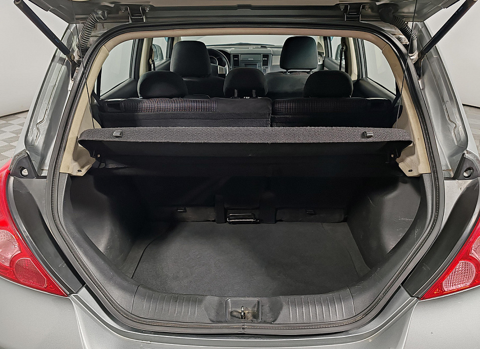 Nissan Tiida, I Рестайлинг 1.6 AT (110 л.с.)