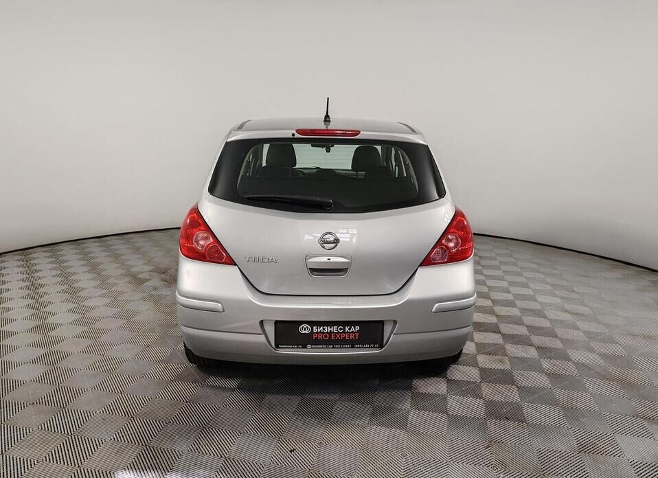 Nissan Tiida 1.6 AT (110 л.с.)