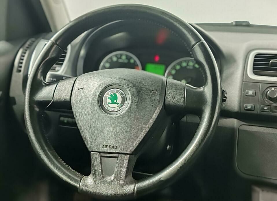 Skoda Roomster 1.6 AT (105 л.с.)