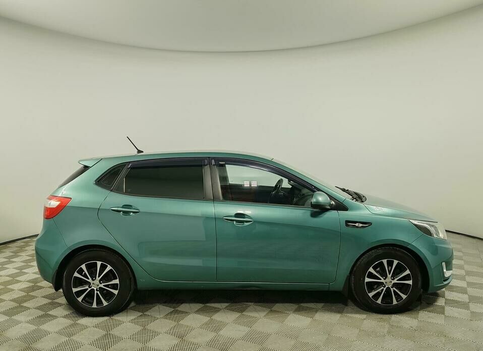 Kia Rio 4-speed 1.6 AT (123 л.с.)