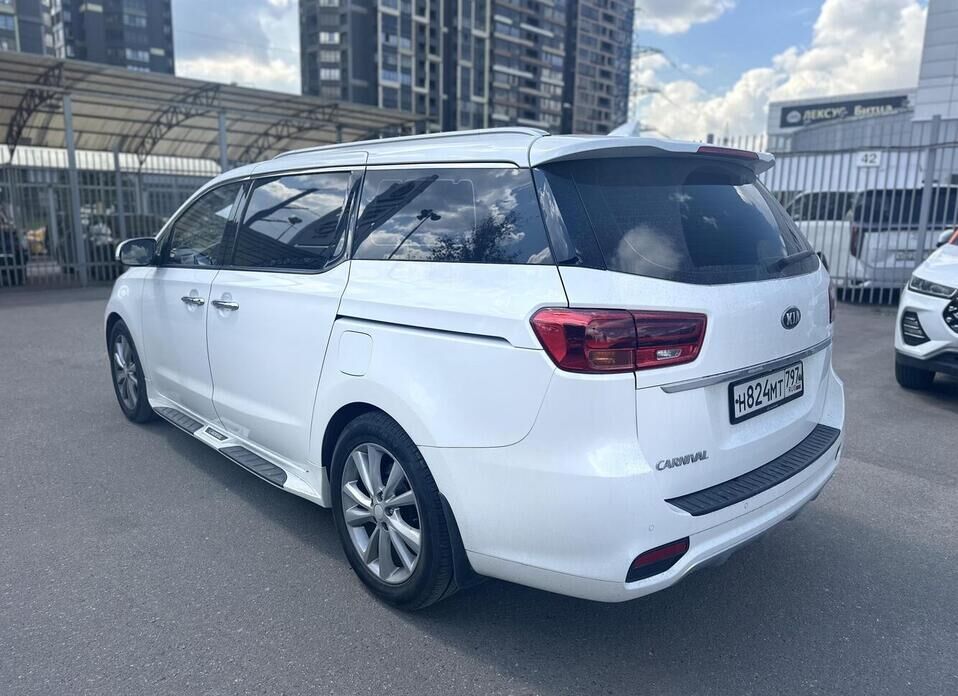 Kia Carnival, III 2.2d AT (202 л.с.)