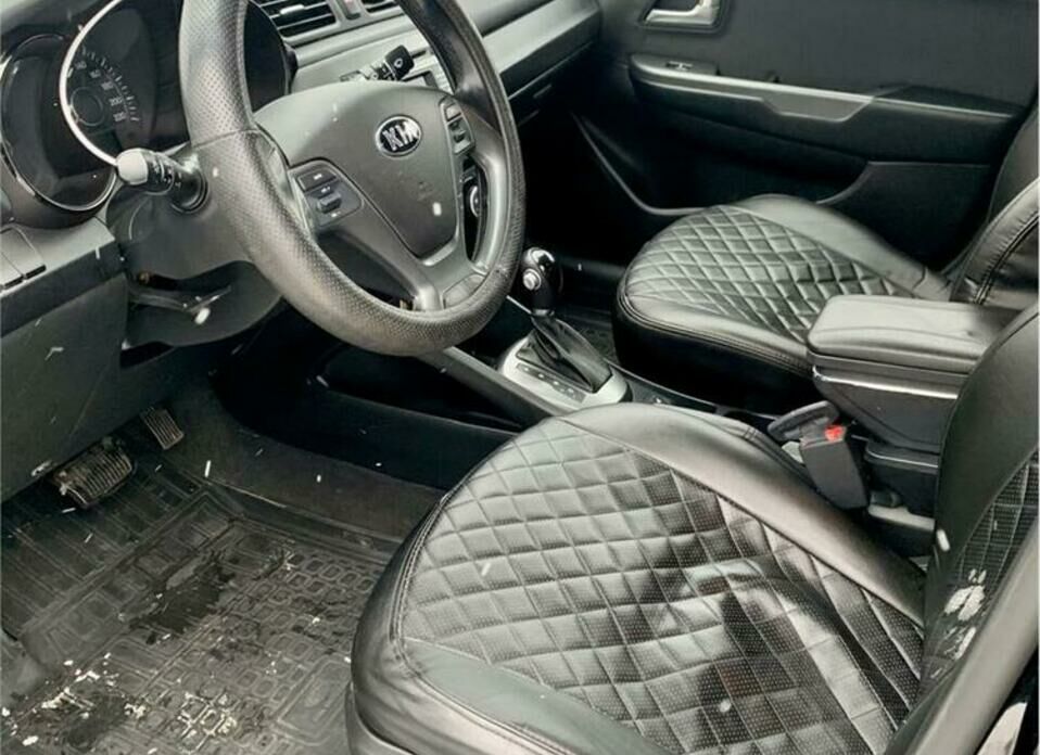 Kia Rio 1.6 AT (123 л.с.)