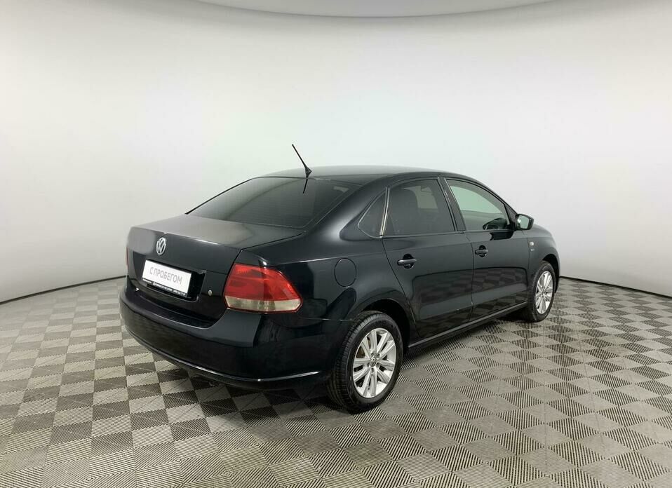 Volkswagen Polo 1.6 AT (105 л.с.)