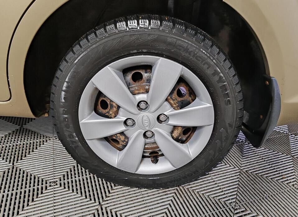 Kia Rio, II Рестайлинг 1.4 AT (95 л.с.)