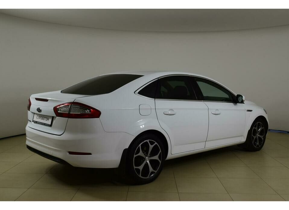 Ford Mondeo 2.0d AT (140 л.с.)