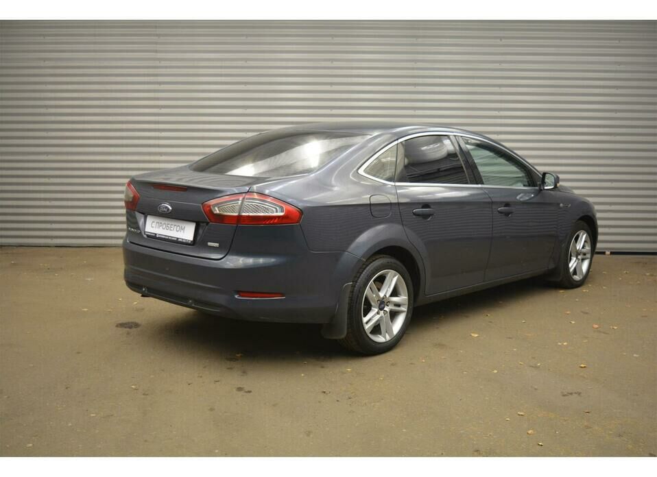 Ford Mondeo 2.0d AT (140 л.с.)