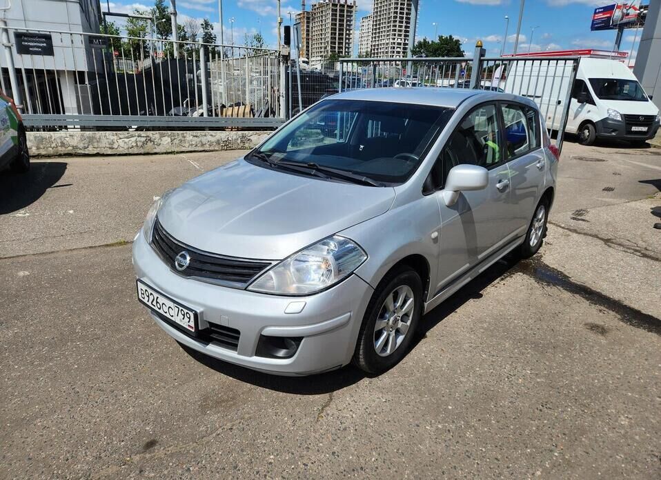 Nissan Tiida 1.6 AT (110 л.с.)