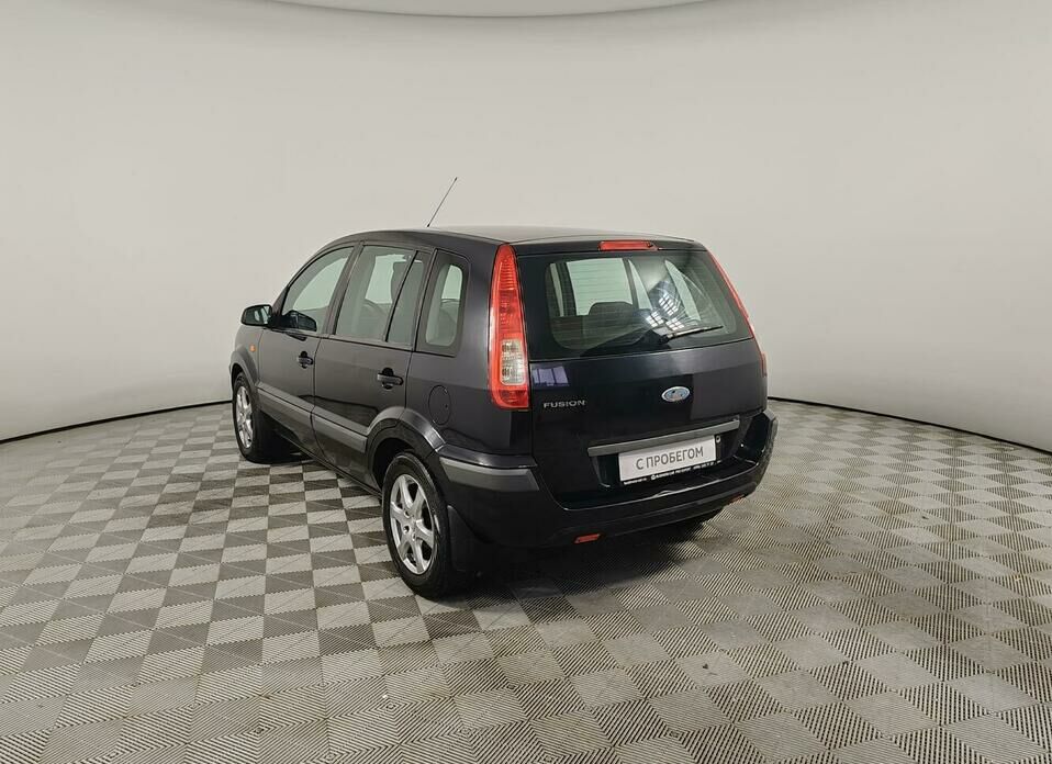 Ford Fusion 1.6 AT (101 л.с.)