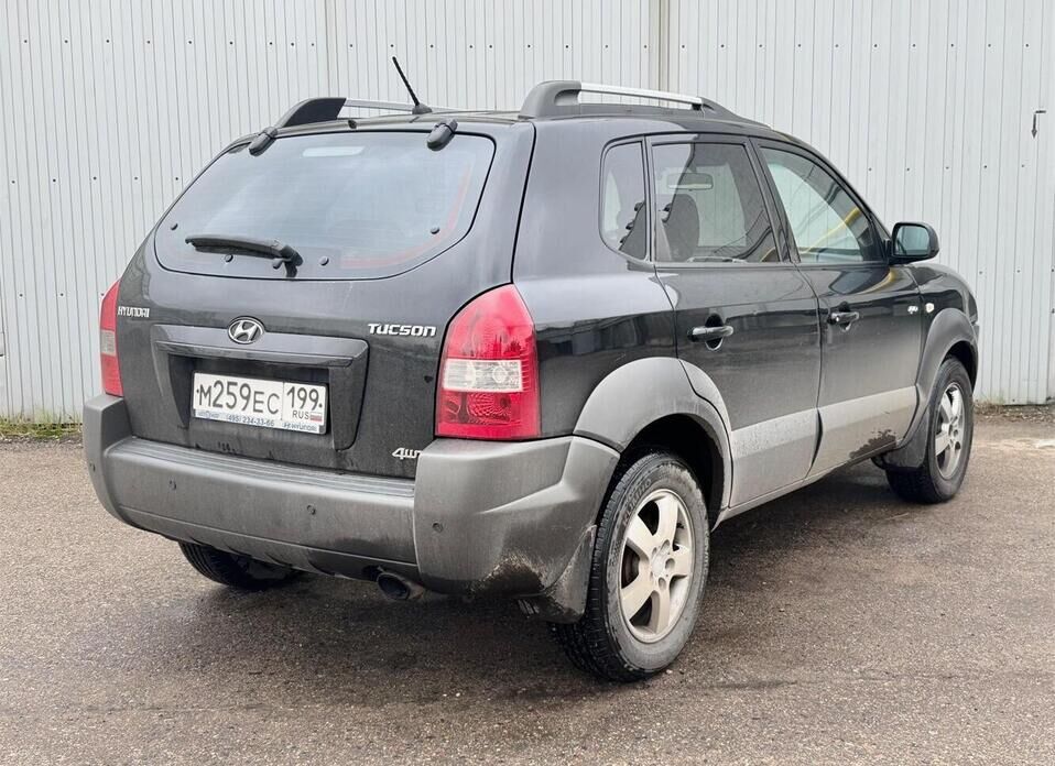 Hyundai Tucson, I 2.0 AT (141 л.с.) 4WD