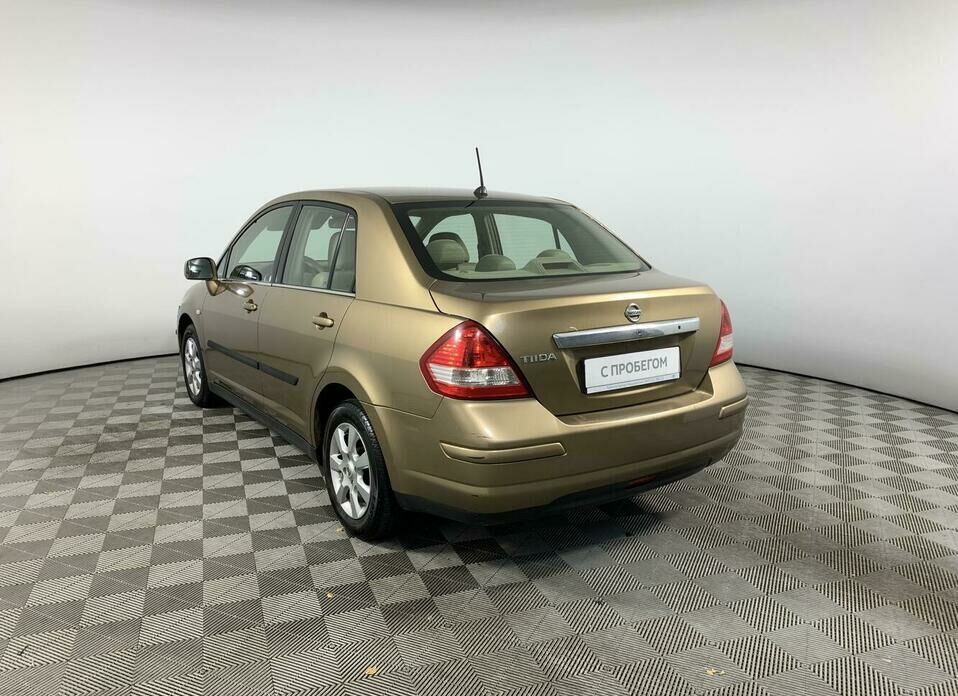 Nissan Tiida 1.6 AT (110 л.с.)