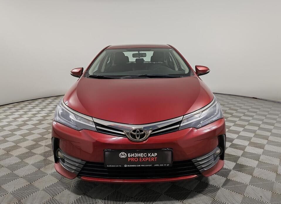 Toyota Corolla, XI (E160, E170) Рестайлинг 1 1.6 CVT (122 л.с.)