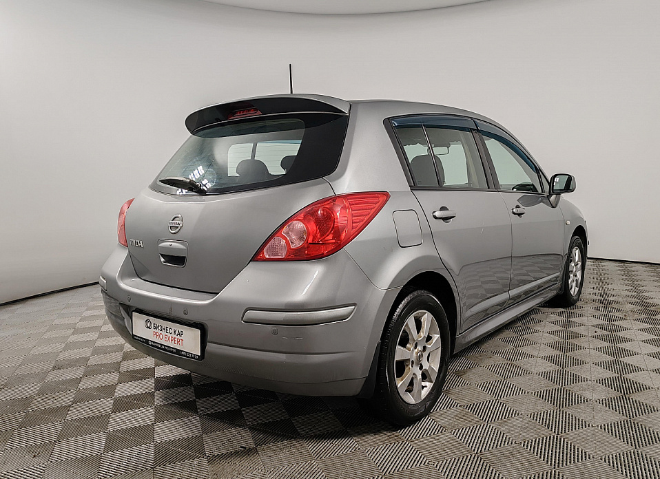 Nissan Tiida, I Рестайлинг 1.6 AT (110 л.с.)