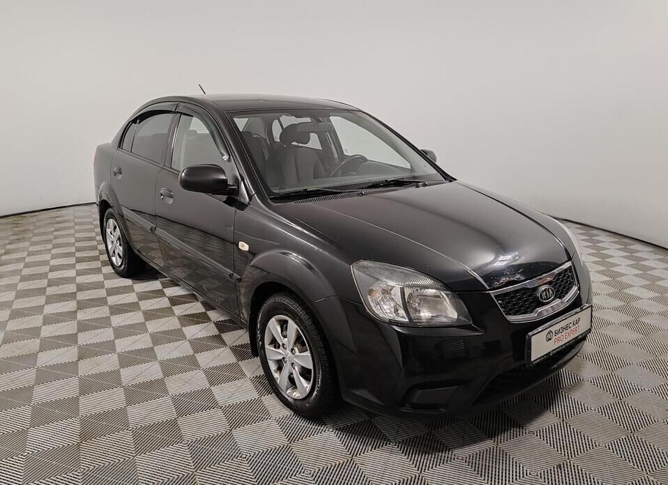 Kia Rio, II Рестайлинг 1.4 AT (95 л.с.)