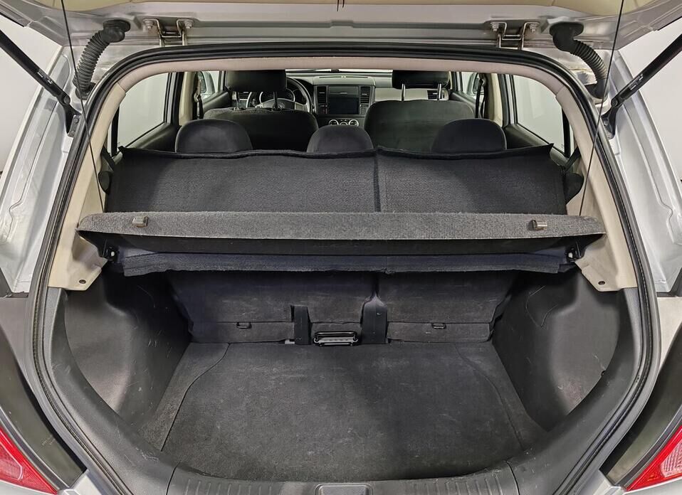 Nissan Tiida 1.6 AT (110 л.с.)