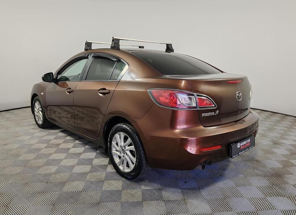 Mazda 3, II (BL) Рестайлинг 1.6 AT (105 л.с.)