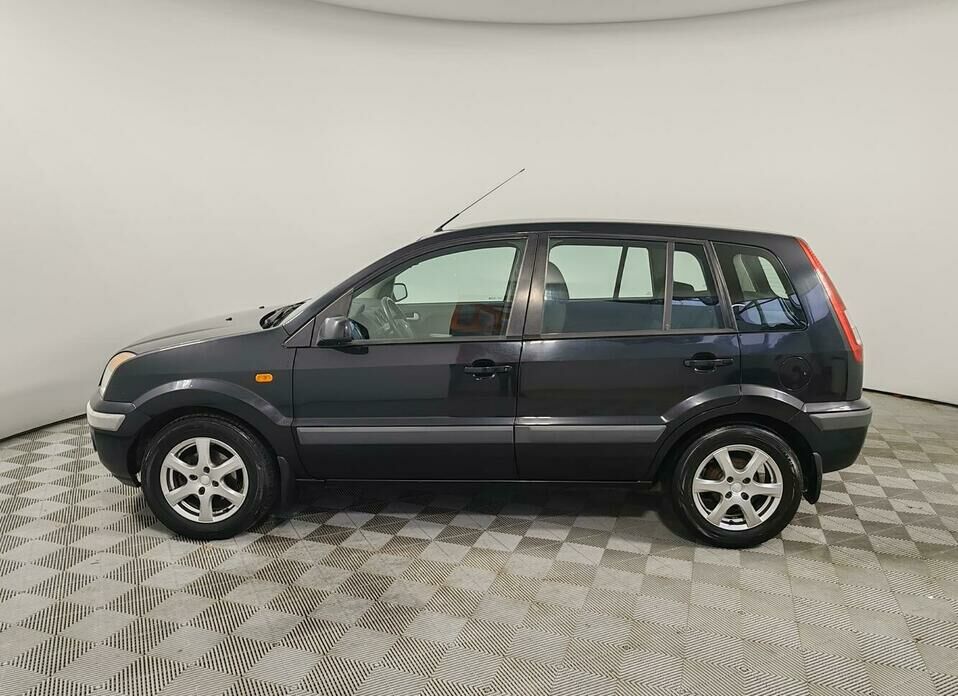 Ford Fusion 1.6 AT (101 л.с.)