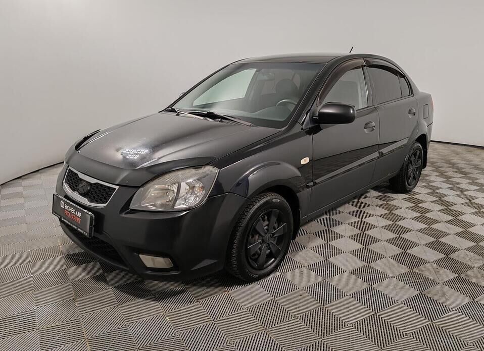 Kia Rio, II Рестайлинг 1.4 MT (97 л.с.)
