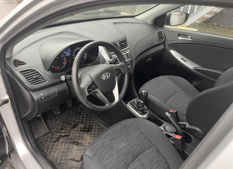 Hyundai Solaris, I Рестайлинг 1.6 MT (123 л.с.)