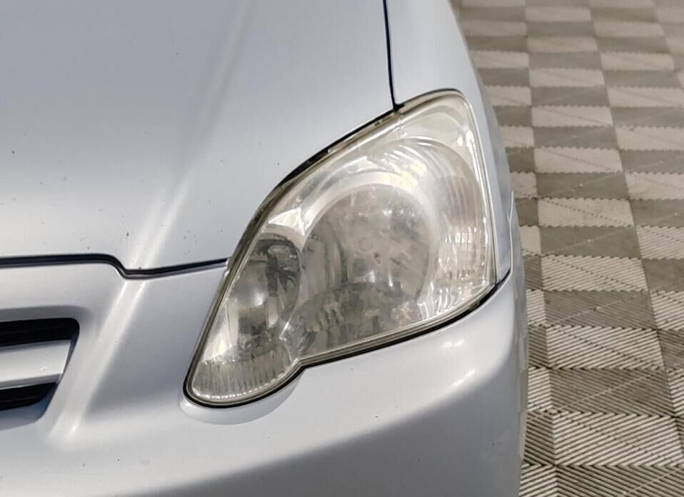 Toyota Corolla, IX (E120, E130) Рестайлинг 1.6 AT (110 л.с.)