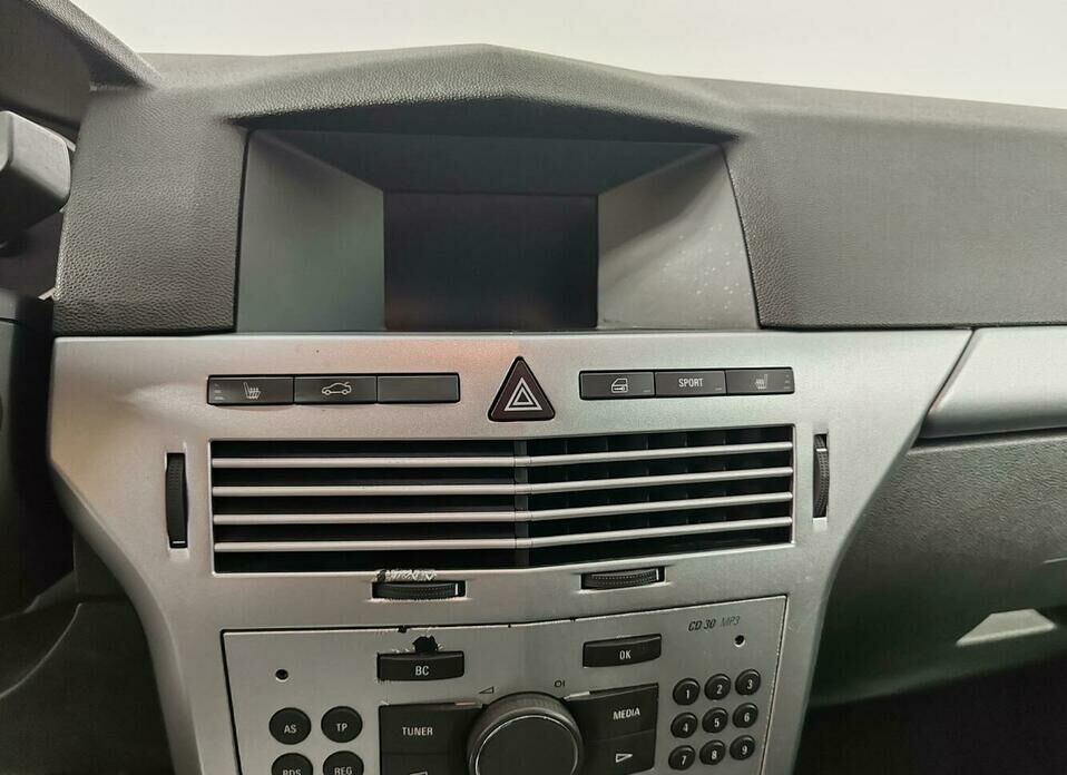 Opel Astra 1.8 AT (140 л.с.)