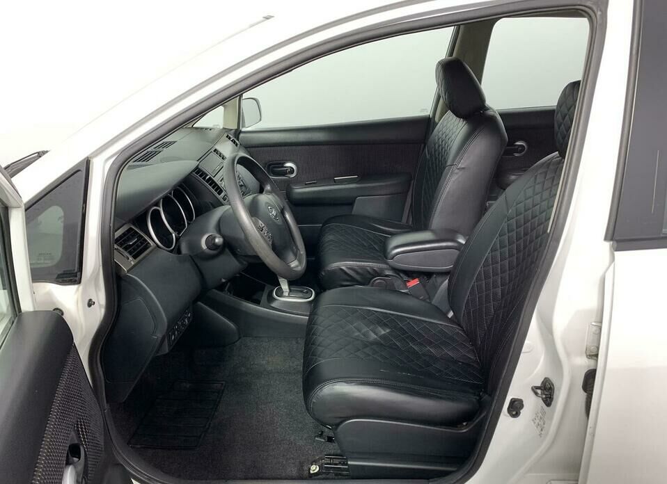 Nissan Tiida 1.6 AT (110 л.с.)