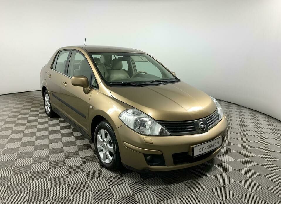 Nissan Tiida 1.6 AT (110 л.с.)