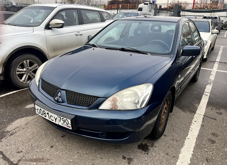 Mitsubishi Lancer, IX 1.6 AT (98 л.с.)