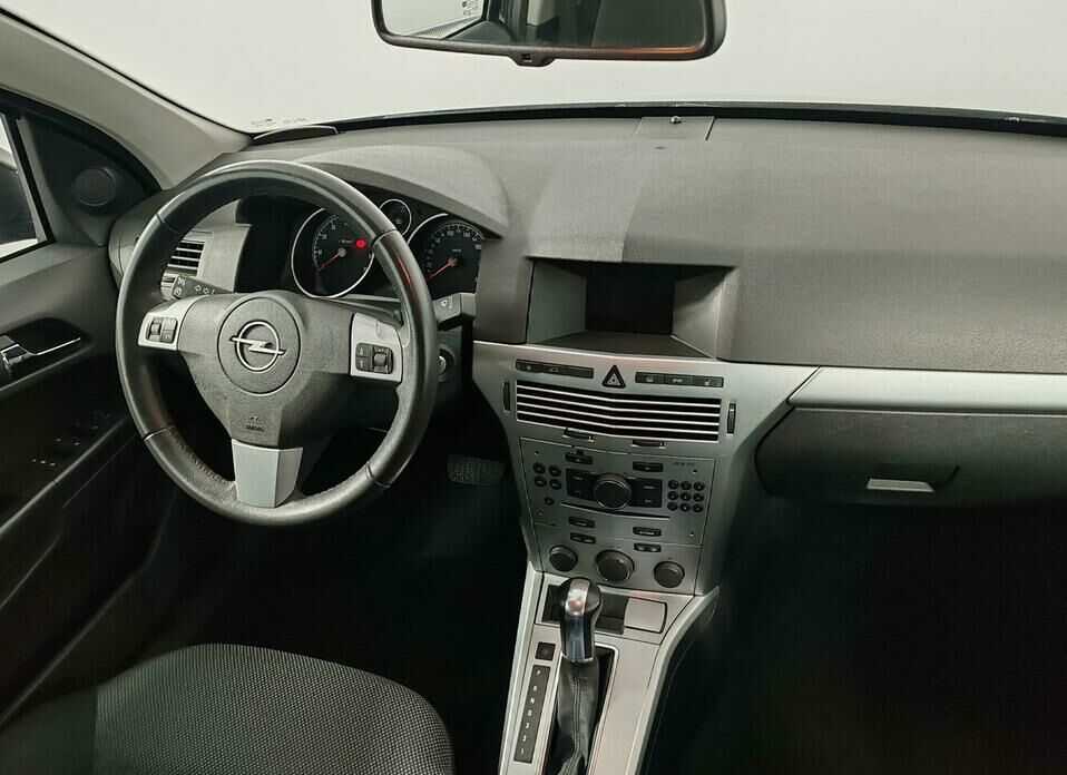Opel Astra 1.8 AT (140 л.с.)