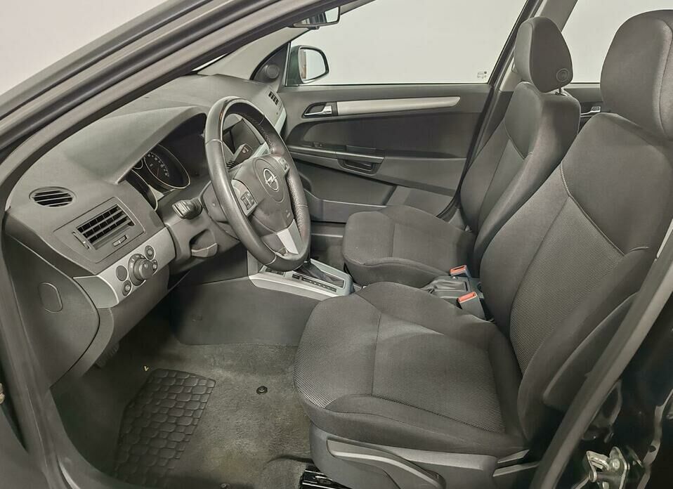 Opel Astra 1.8 AT (140 л.с.)