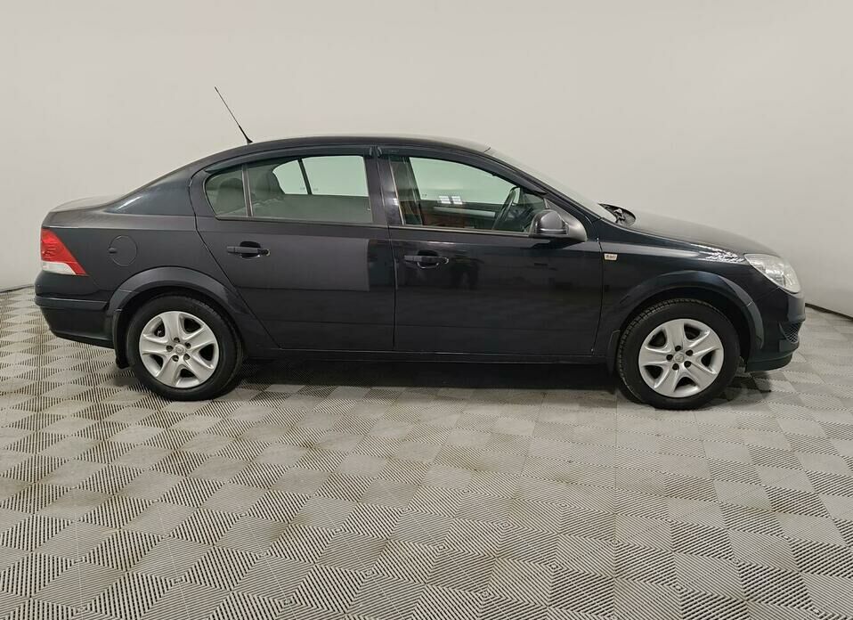 Opel Astra 1.8 AT (140 л.с.)