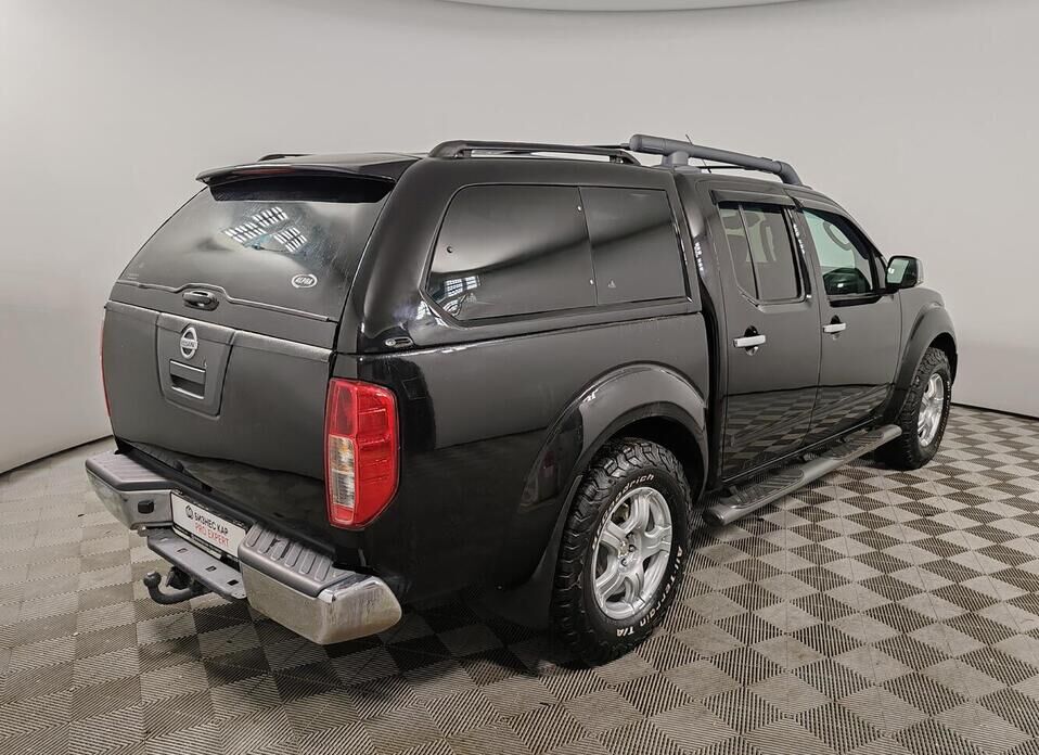 Nissan Navara (Frontier) 2.5d AT (174 л.с.) 4WD
