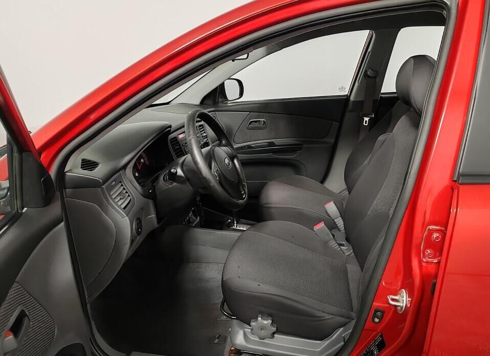 Kia Rio, II Рестайлинг 1.4 AT (95 л.с.)