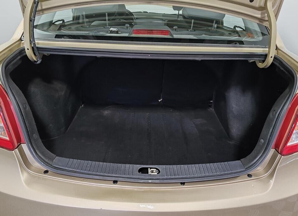 Kia Rio, II Рестайлинг 1.4 AT (95 л.с.)